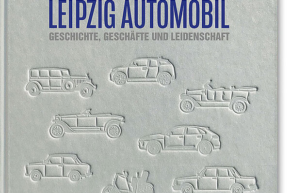 graues Buch mit kunstvollem Einband, Titel: Leipzig Automobil. Geschichte, Geschäfte und Leidenschaft