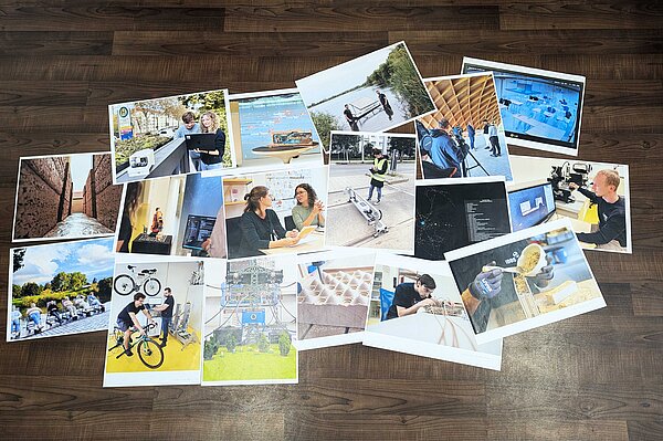 Bilder liegen ausgedruckt auf dem Boden